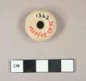 Small stone spindle whorl