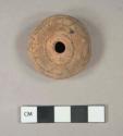 Incised unslipped ware spindle whorl