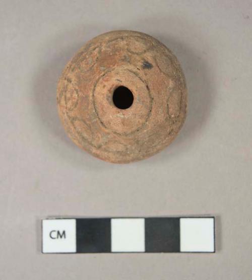 Incised unslipped ware spindle whorl