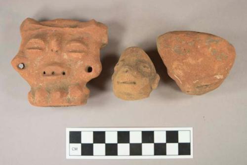 7 archaic pottery figurine heads