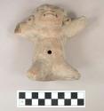 Large pottery sitting figurine  traces of white slip.