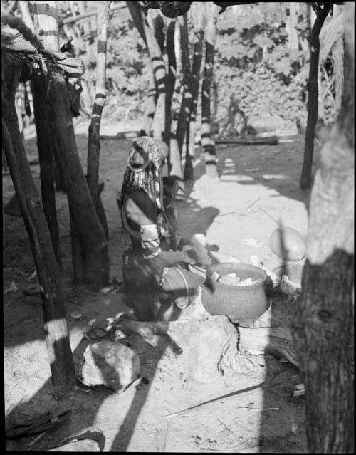 Rungiero preparing squash for cooking