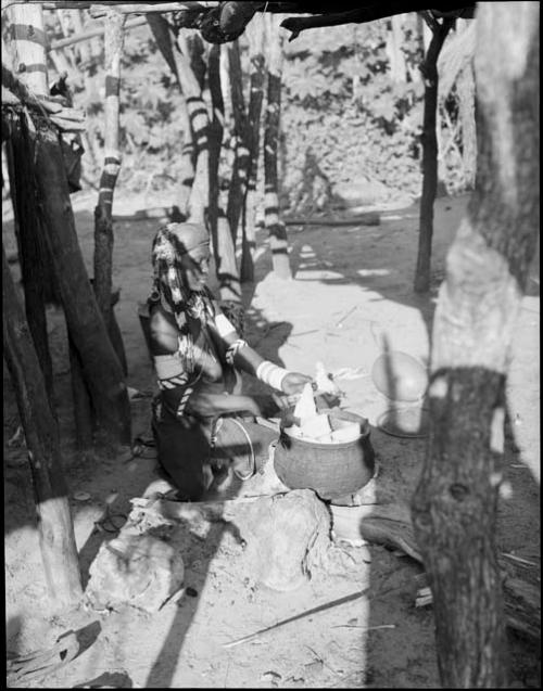 Rungiero preparing squash for cooking