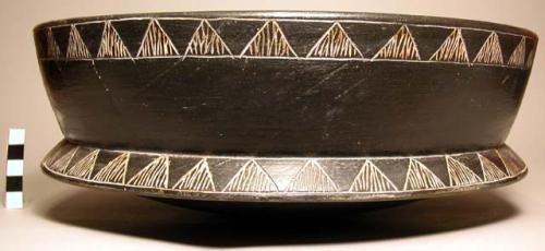 Wooden model of 1/4 of pot of polished black ware, incised