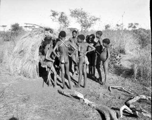 Group of boys standing beside a skerm