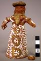 Ceramic female effigy figurine with cymbals