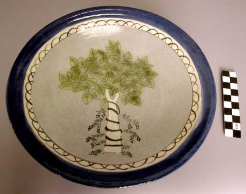 Ceramic polychrome glazed dish, tree motif