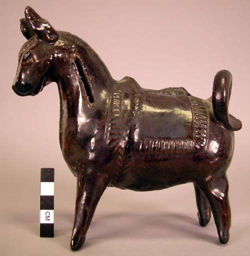 Ceramic brown glazed horse bank with enclosed coins