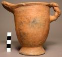 Pitcher of red ware