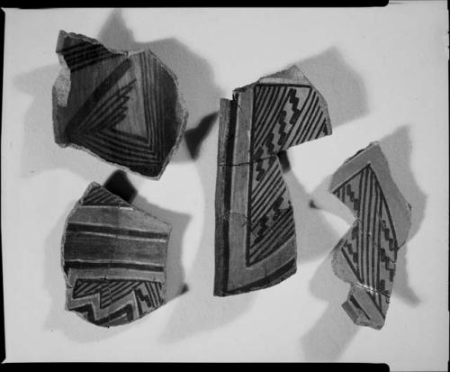 Photograph and negative of painted ceramics from the Jeddito Expedition, page 9