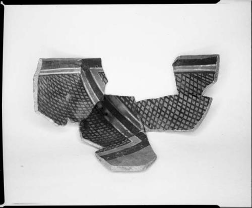 Photograph and negative of painted ceramics from the Jeddito Expedition, page 13