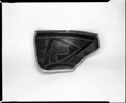 Photograph and negative of painted ceramics from the Jeddito Expedition, page 30