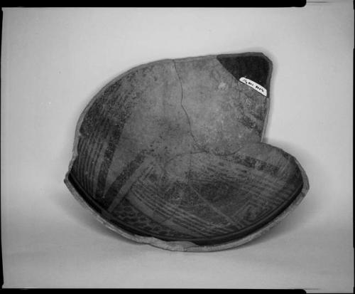 Photograph and negative of painted ceramics from the Jeddito Expedition, page 33
