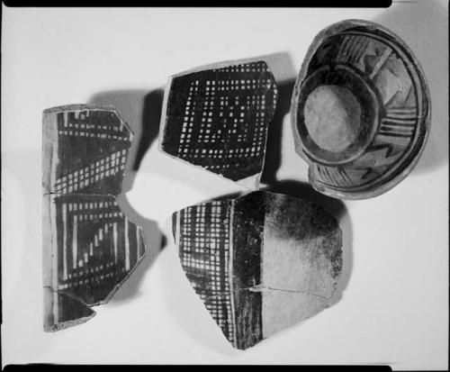 Photograph and negative of painted ceramics from the Jeddito Expedition, page 44