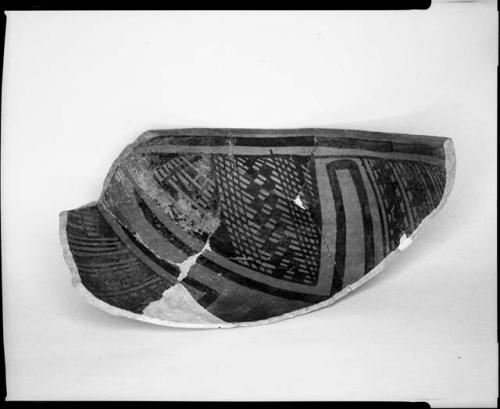 Photograph (missing) and negative of painted ceramics from the Jeddito Expedition, page 65