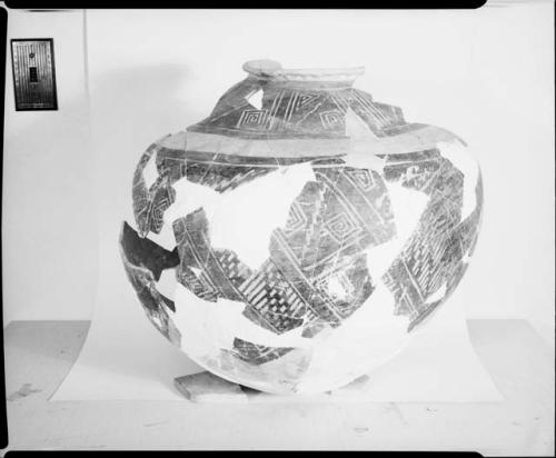 Photograph and negative of painted ceramics from the Jeddito Expedition, page 69