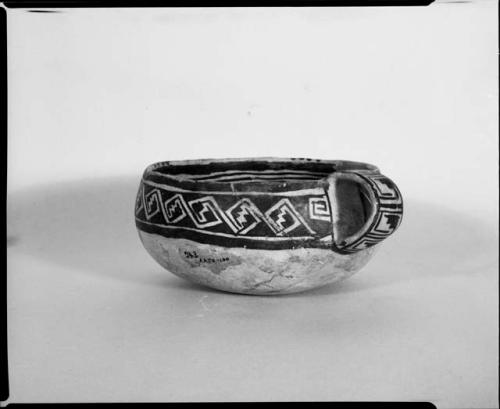 Photograph and negative of painted ceramics from the Jeddito Expedition, page 74