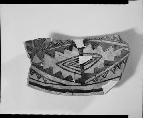 Photograph (missing) and negative of painted ceramics from the Jeddito Expedition, page 79