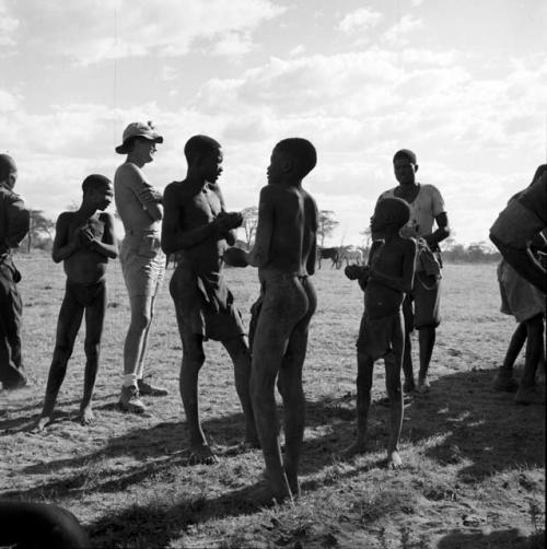 Group of men and boys standing with Nicholas England