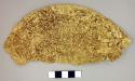 Portion of large gold disk- embossed