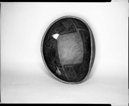 Photograph and negative of painted ceramics from the Jeddito Expedition, page 110