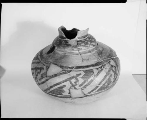 Photograph (missing) and negative of painted ceramics from the Jeddito Expedition, page 117