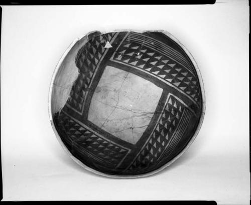 Photograph and negative of painted ceramics from the Jeddito Expedition, page 131