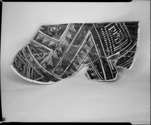 Photograph (missing) and negative of painted ceramics from the Jeddito Expedition, page 89