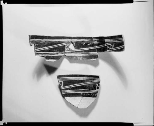 Photograph and negative of painted ceramics from the Jeddito Expedition, page 90