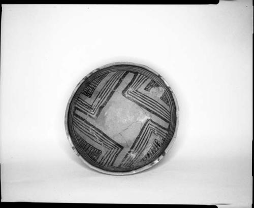 Photograph and negative of painted ceramics from the Jeddito Expedition, page 135