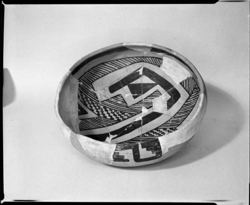 Photograph and negative of painted ceramics from the Jeddito Expedition, page 147