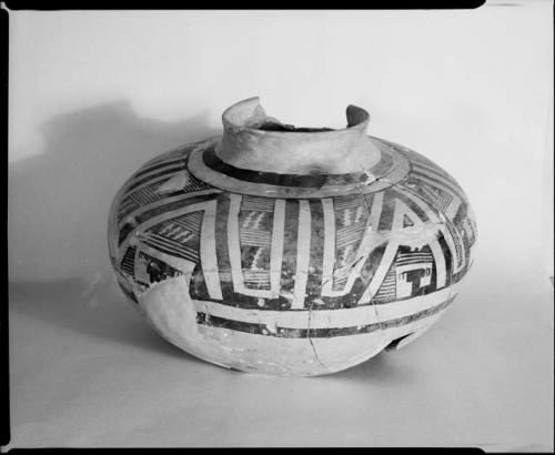 Photograph and negative of painted ceramics from the Jeddito Expedition, page 174