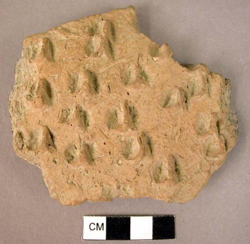 Potsherd of Barbotine ware with finger-tip impression