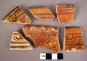 6 pieces, rim sherds.  Both sides painted, gold, black and red predominant