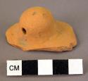 Footsherd.  Unslipped orange ware.