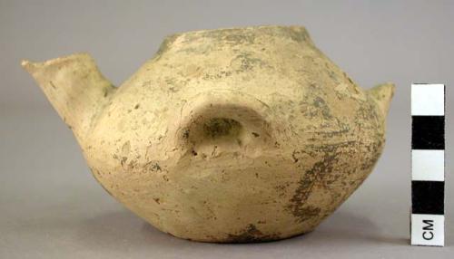 Spouted pottery vessel - two handles