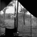 Chair in the opening of an expedition tent, view from inside