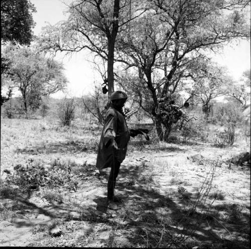 Man wearing Western clothing, standing