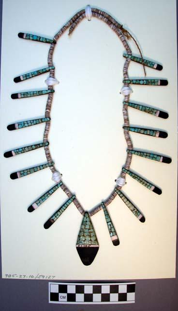 Santo Domingo necklace. 1 strand of shell beads w/ long inlay pendants intersper