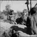 Boys playing !ó'm!hú / !’Om g!xuni / ’Ai kota !U!u g!xuni / N!aih //’an (the porcupine game, also known as the axe game, assegai game or war game)