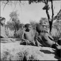 Boys playing !ó'm!hú / !’Om g!xuni / ’Ai kota !U!u g!xuni / N!aih //’an (the porcupine game, also known as the axe game, assegai game or war game)