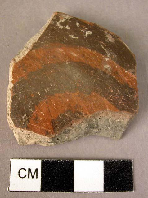 Potsherd - black on red, Dimini style but curvilinear (Wace & Thompson, 1912, Ty