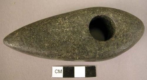 Perforated stone battle axe