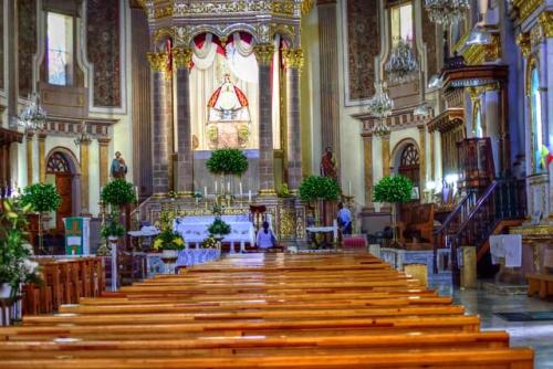 "Basilica de Nuestra Senora de la Salud (Our Lady of Health), altar and pews"