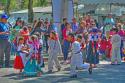 "Parade at the Plaza Grande, Patzcuaro, costumed children playing"