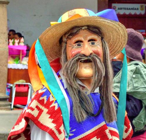 "Danza de los Viejitos (Dance of the Old Men) masked performer, Plaza Grande"