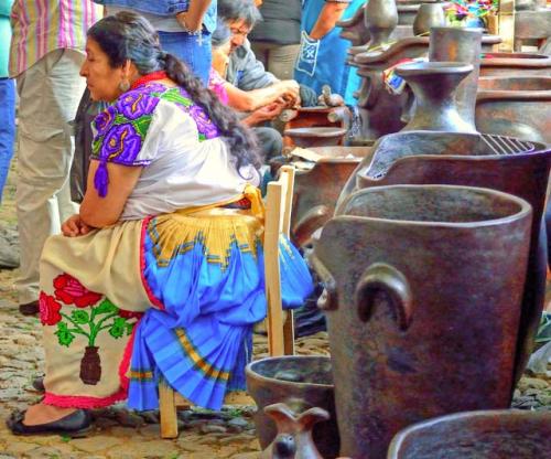 "Vendor: a woman selling pottery, Plaza Grande, Patzcuaro"