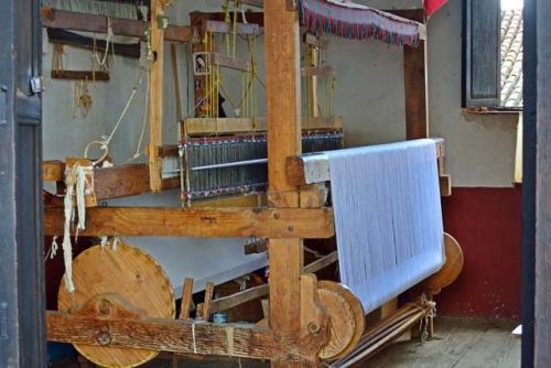 "Textile museum display at Casa de Once Patios, former Catholic convent, loom"