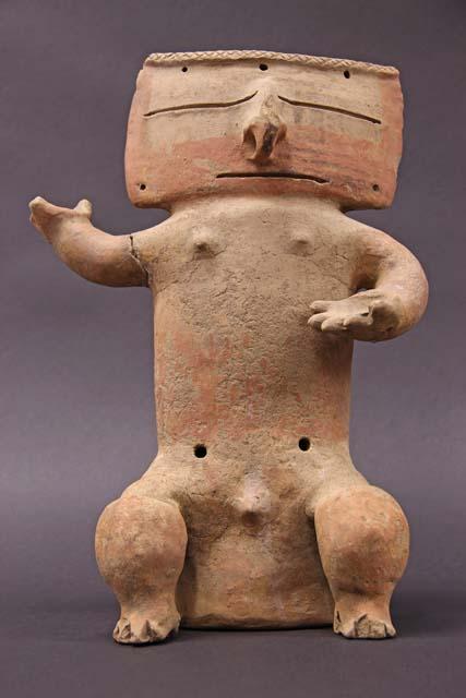 Terra cotta vase, grotesque human form