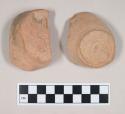 Coarse red bodied earthenware base sherds, with red slip, wheel thrown